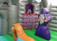 El castillo de salto inflable púrpura/gris con la diapositiva del dragón cubrió el patio