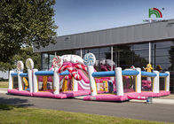 Parque de atracciones inflable de Candyland de Platón del rosa comercial del PVC 10m con la diapositiva