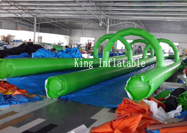 Ciudad inflable del agua del resbalón de la lona del PVC de los carriles dobles inflables de la diapositiva los 300m de largo