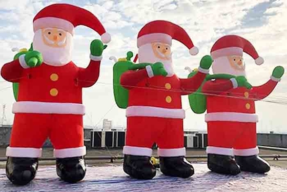 La decoración navideña gigante inflable de Papá Noel yarda explota los inflables de Papá Noel