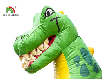 Casa inflable modificada para requisitos particulares de la despedida de los dinosaurios del tamaño/castillo animoso del niño con la diapositiva