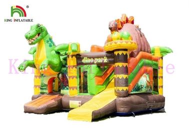El PVC del tema del dinosaurio explota el castillo animoso con la aventura de la selva de la diapositiva para los niños